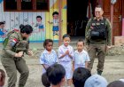 Hadirkan Senyuman di TK Negeri Pembina Oksibil, Satgas Ops Damai Cartenz-2025 Bangkitkan Semangat Anak-Anak Papua