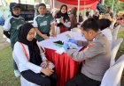 Polres Metro Bekasi Kota Gelar Pelayanan Publik Dalam Rangka HUT Bhayangkara Ke 79 Saat Car Free Day disambut Antusias Warga