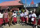 Kebersamaan Satgas Operasi Damai Cartenz dengan Anak-Anak di SD Negeri Mulia, Puncak Jaya